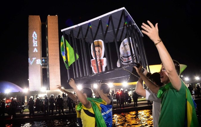 A protest against Brazil’s president, Dilma Rousseff, in Brasilia on Monday. Credit: Andressa Anholete/Agence France-Presse — Getty Images